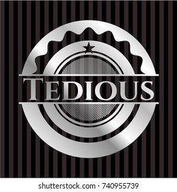 Tedious silvery badge