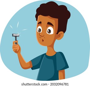 
 Teen Boy Holding Razor For First Shave Vector Cartoon. Teenager Thinking About Shaving Having No Clue About It
