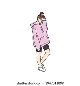 Teen girl with a bun hairstyle, holding his head, in a trendy sporty outfit. Young female in a leggings, hoodie and sneakers. Vector illustration in korean style isolated on white background