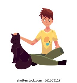 Teenage boy sitting on the floor and stroking a big black cat, cartoon vector illustration on white background. Front view, full length portrait of boy sitting and gently stroking a black cat