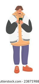 Teenage boy using a smartphone wearing winter clothes, baseball jacket, hoodie, jeans and sneakers. Trendy casual stylish fashion outfit. Flat vector illustration isolated on white background