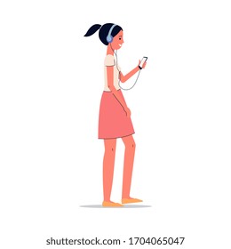 Teenage girl listening to music on headphones and looking at phone screen while walking - female cartoon character using modern technology, isolated flat vector illustration