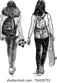 teenage girls go with their skateboards
