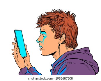 a teenage guy and a smartphone. internet and apps