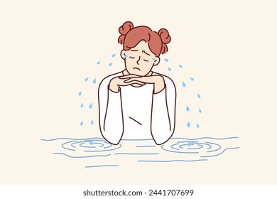 Teenage woman is crying sitting at table, experiencing stress and depression due to problems with classmates or school bullying. Girl crying after breaking up with boyfriend or quarrel with friend