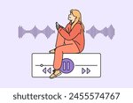 Teenage woman listens to music on phone, sitting near equalizer on buttons to control playlist. Music lover girl uses audio application on smartphone to play favorite songs or audio books