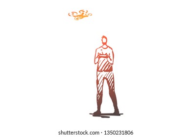 Teenager, boy, drone, device, technology concept. Hand drawn teenager boy playing with drone concept sketch. Isolated vector illustration.