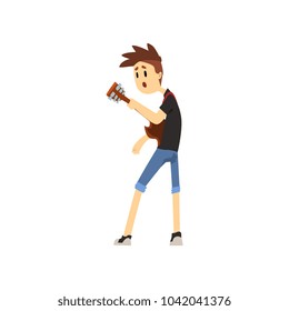 Teenager boy playing on guitar. Cartoon character of young artist with stylish haircut in blue shorts and black t-shirt. Guitarist of rock band. Flat vector design