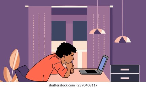 Teenager boy sitting at desk with laptop computer.