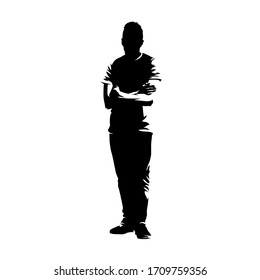 Teenager boy standing with folded arms, isolated vector silhouette. Ink drawing