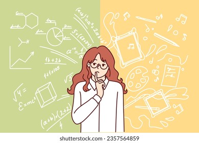 Teenager girl chooses between study and creativity, standing near chalkboard with formulas and drawings of paints. Thoughtful female student teenager keeping balance, studying at university