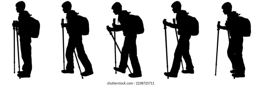 Teenager tourist with backpack and hiking stick walking. Outdoor traveling and nature camping. Man traveler on a trip, the boy stands. Tracking through mountains and trails, adventure time. Isolated