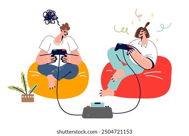 Teenagers play video games using joysticks and set-top box, sitting in soft chairs in living room. Man who loses video games feels embarrassed located near woman who wins and is into cyber sports.