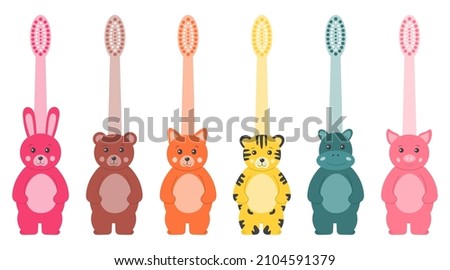 Teeth cleaning accessories. Cute set of baby toothbrushes in the shape of animals. Funny cute dental care accessories for children. Children's dental hygiene. Trendy tooth brushes for kids.