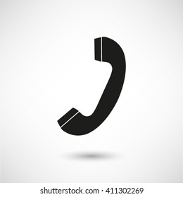 Telephone receiver - black vector  icon with shadow