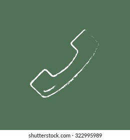 Telephone receiver hand drawn in chalk on a blackboard vector white icon isolated on a green background.
