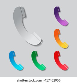 Telephone receiver icon set. paper design with colored objects