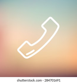 Telephone receiver icon thin line for web and mobile, modern minimalistic flat design. Vector white icon on gradient mesh background.