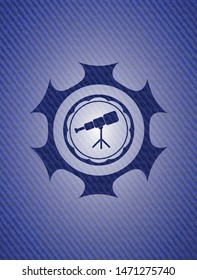 telescope icon inside badge with denim background