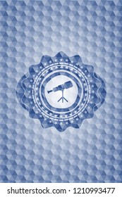 telescope icon inside blue polygonal emblem.