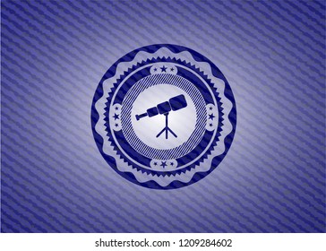 telescope icon inside emblem with denim high quality background
