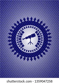 telescope icon inside emblem with jean background
