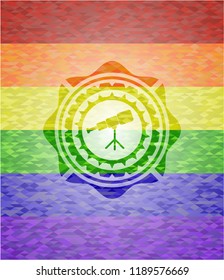 telescope icon inside emblem on mosaic background with the colors of the LGBT flag