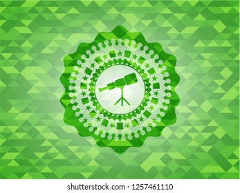 telescope icon inside green emblem with mosaic ecological style background