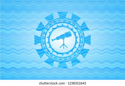 telescope icon inside light blue water wave emblem.