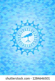 telescope icon inside light blue mosaic emblem