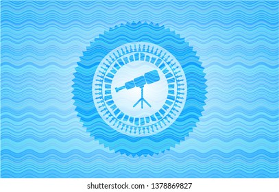 telescope icon inside light blue water style emblem.