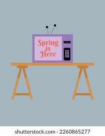 Television on a Table with the program show Spring is Here