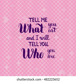Tell me what you eat and I will tell you who you are. Illustration with hand-lettering inspiration and motivation quote. Purple Text on pink background with circles.