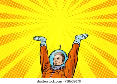 template astronaut holding something on his hands. Pop art retro vector illustration