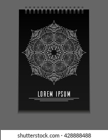 Template black notebook on springs with freehand mandala and place for text. Vector element for your design