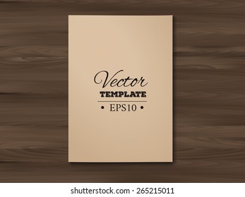 Template of a blank paper sheet on a wooden background. EPS 10 vector. 