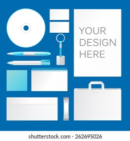 Template for business design. consists of a blank, disc, business cards, pens, marker bit, envelopes, bags, key chains, stickers. All in white and blue