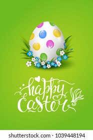 Template card with handwritten inscription Happy Easter and realistic decorated egg. Vector green background. Brush lettering, calligraphy. Hand drawn font. Grass and flowers.