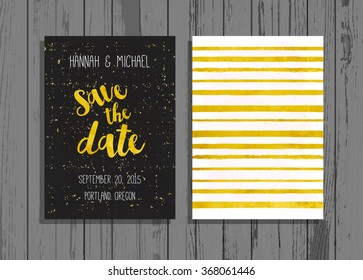 Template design card Save the Date lettering with gold foil particles on a wood background