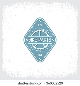 Template design label with cogwheel and rays in retro style on grunge background. Vector illustration.