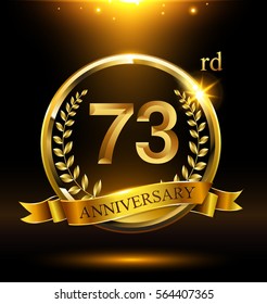 Template golden logo 73rd anniversary with ring and laurel branches on dark background