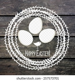 Template for greeting card or invitation. Eggs in the nest. Happy Easter! Wood texture, vector background.