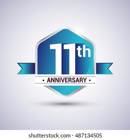 Template Logo 11th anniversary celebration. Blue and silver colored hexagon shape, vector design.