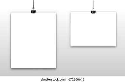 Template of office paper, on a gray background, suspended on thread