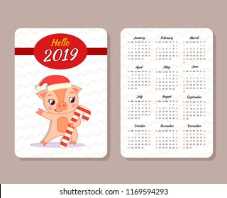 Template of the pocket calendar 2019. Chinese calendar for the year of pig 2019. Cute pig dances with a Christmas candy
