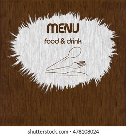 Template for restaurant menu spot of white paint on the wooden background with the stencil.
