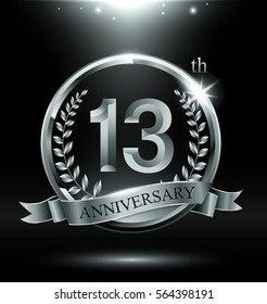 Template silver logo 13th anniversary with ring and laurel branches on dark background