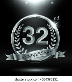 Template silver logo 32nd anniversary with ring and laurel branches on dark background