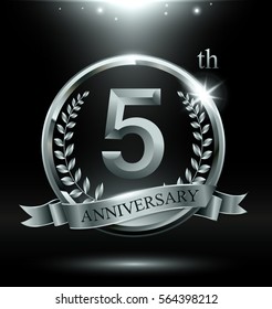 Template silver logo 5th anniversary with ring and laurel branches on dark background