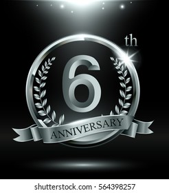 Template silver logo 6th anniversary with ring and laurel branches on dark background